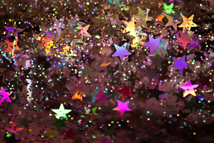Stock photo of glittering star confetti.