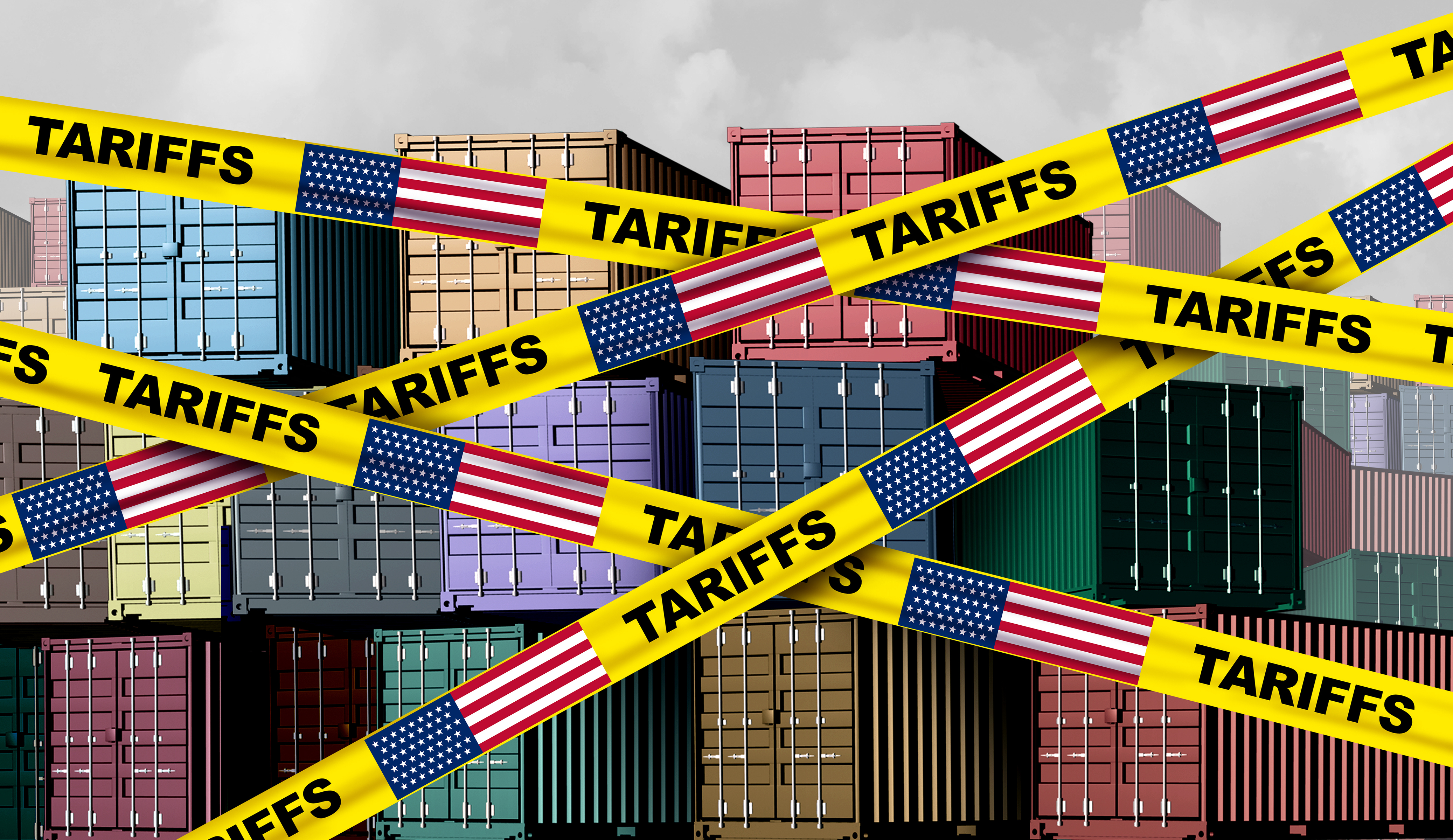 Photo of containers with tape drawn across their fronts, marked with American flags and the word "tariffs".