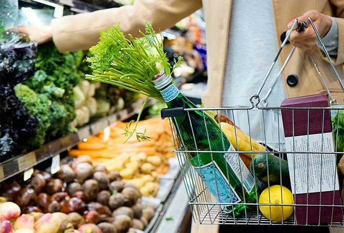 Stock photo of a person grocery shopping