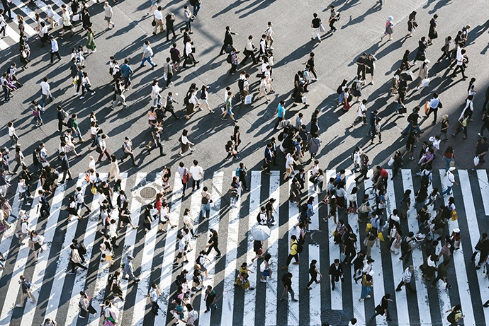 Stock photo of a busy street with lots of people